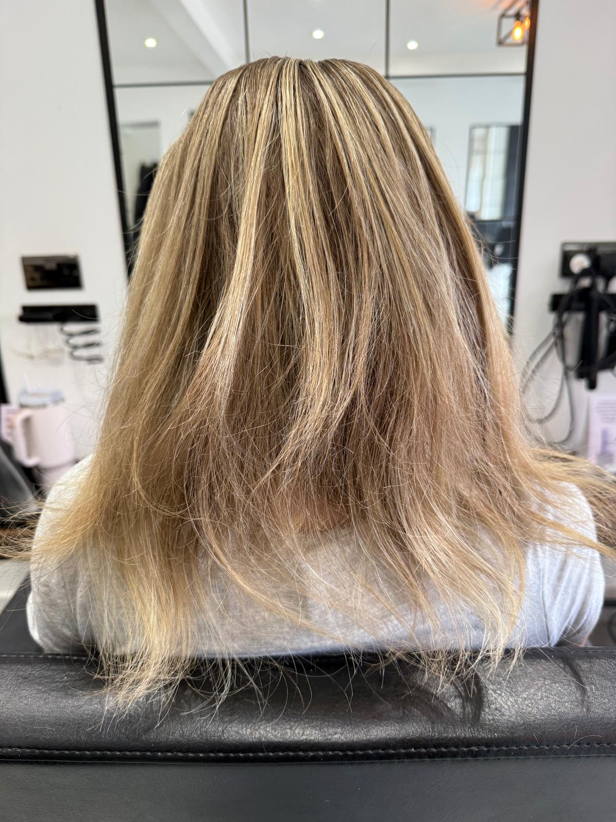 Before photo of highlighted blonde hair before a Rebecca Jane Hair appointment