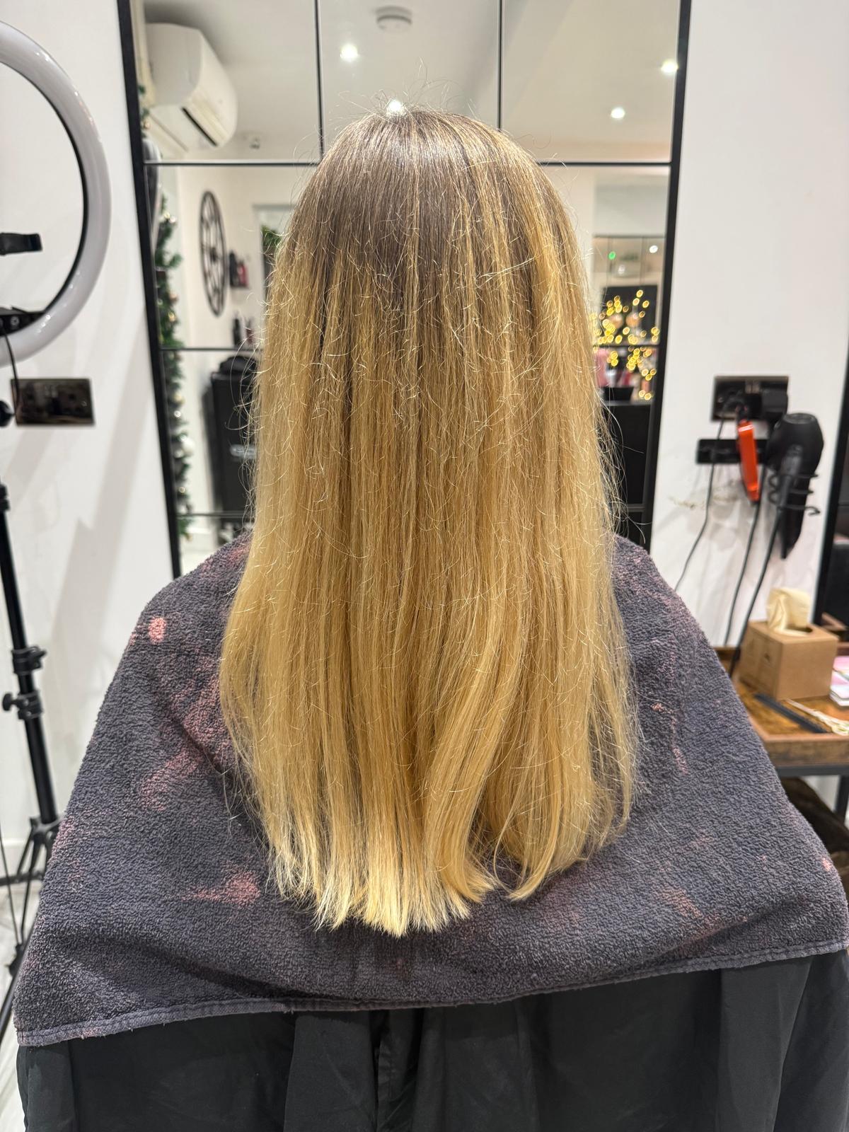Before photo of straight warm blonde hair before a Rebecca Jane Hair appointment