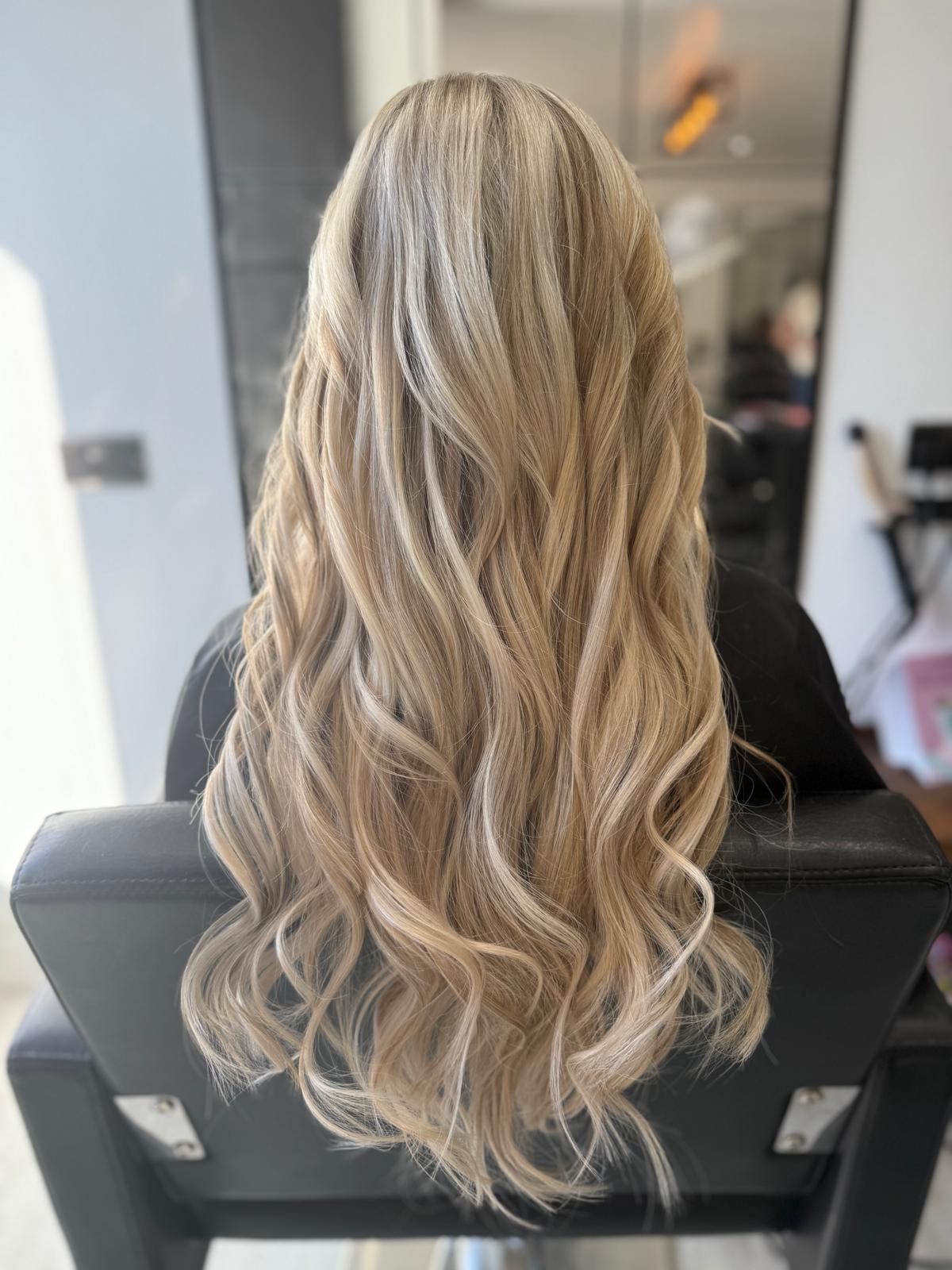 After photo of creamy blonde waves by Rebecca Jane Hair